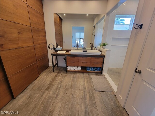 160 Coral Vine Dr, Naples, FL 34110 - full bathroom featuring recessed lighting, wood finished floors, a walk in shower, and vanity