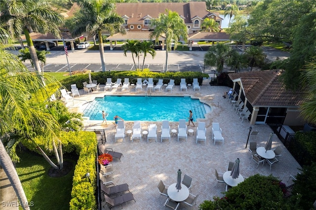 community pool with a patio