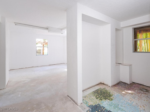 4738 Jackfish St, Bonita Springs, FL 34134 - empty room with unfinished concrete floors