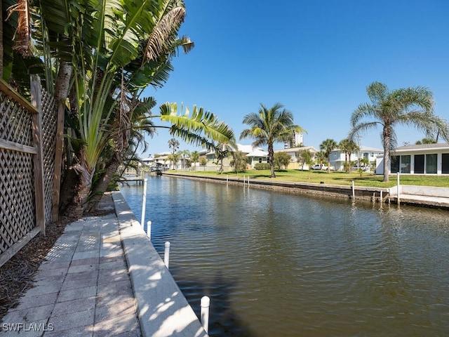 4738 Jackfish St, Bonita Springs, FL 34134 - dock area featuring a water view and a residential view