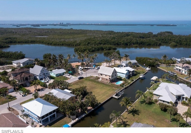 4738 Jackfish St, Bonita Springs, FL 34134 - drone / aerial view featuring a residential view and a water view