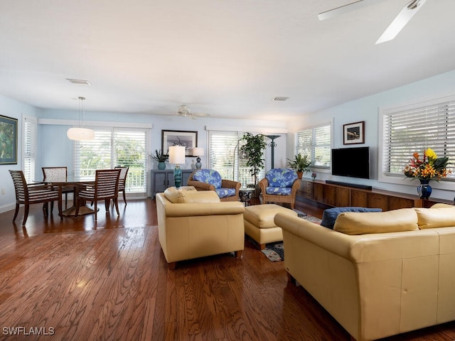 4738 Jackfish St, Bonita Springs, FL 34134 - living area featuring ceiling fan, baseboards, visible vents, and dark wood-style flooring