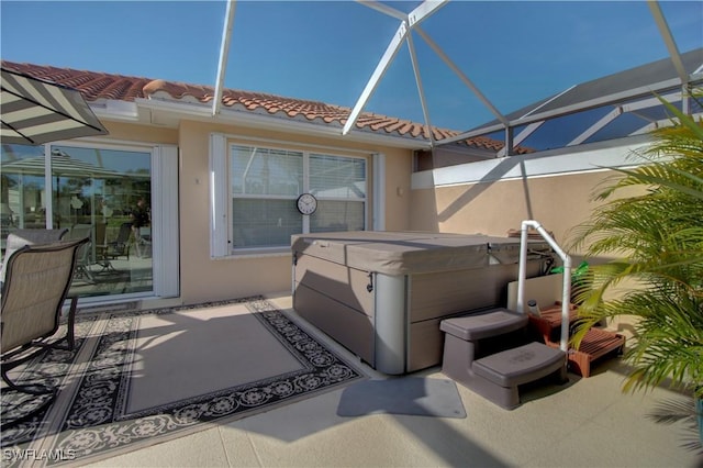 7547 Novara Ct, Naples, FL 34114 - view of patio / terrace featuring a hot tub and a lanai