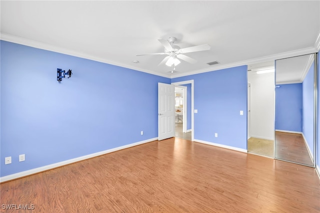 7547 Novara Ct, Naples, FL 34114 - unfurnished bedroom featuring visible vents, baseboards, and ornamental molding