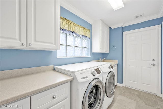 7547 Novara Ct, Naples, FL 34114 - laundry room featuring independent washer and dryer, ornamental molding, visible vents, a sink, and cabinet space