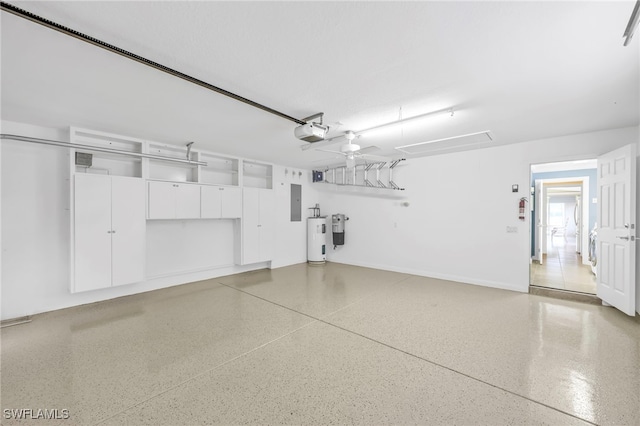 7547 Novara Ct, Naples, FL 34114 - garage featuring electric panel, water heater, and a garage door opener