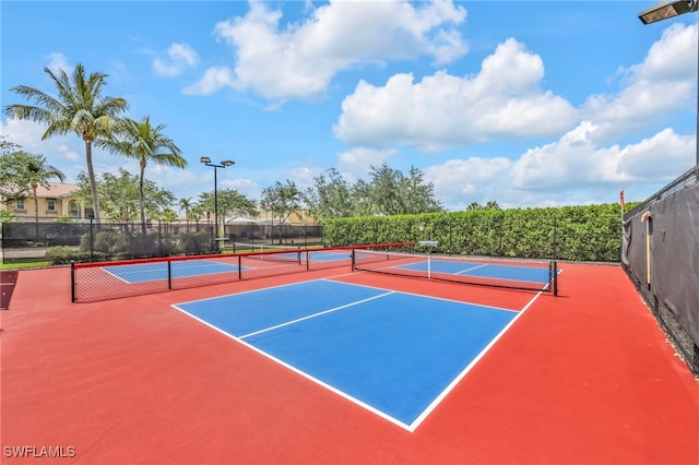 7547 Novara Ct, Naples, FL 34114 - view of sport court with fence and community basketball court
