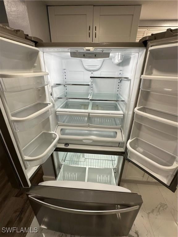 1376 Archer St Unit 6, Lehigh Acres, FL 33936 - room details featuring refrigerator