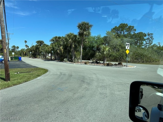 1376 Archer St Unit 6, Lehigh Acres, FL 33936 - view of road featuring traffic signs