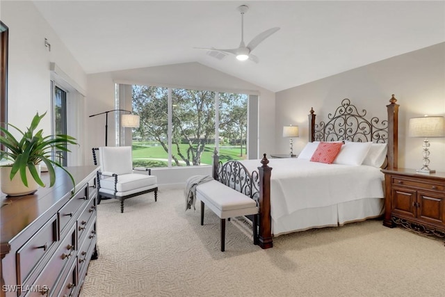 bedroom featuring visible vents, ceiling fan, light carpet, and lofted ceiling