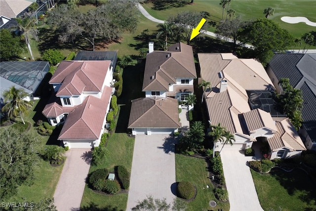birds eye view of property with a residential view