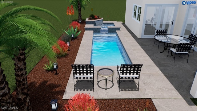 outdoor pool featuring a patio area and an in ground hot tub