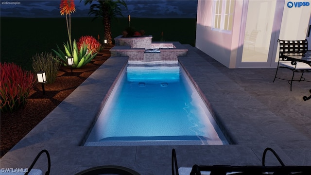 pool featuring a patio area