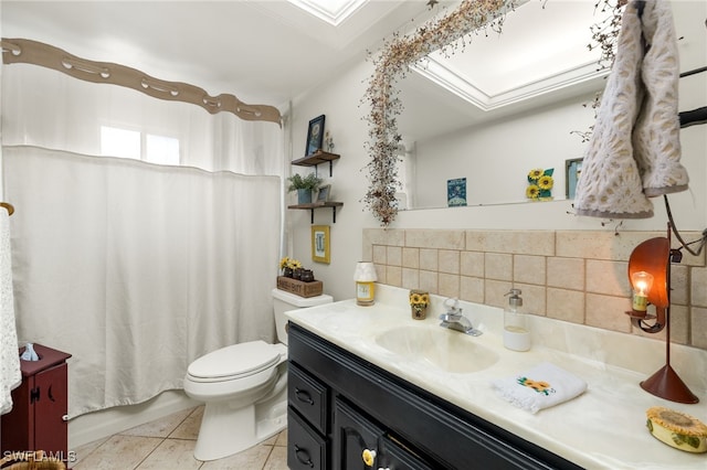 bathroom with tile patterned floors, vanity, toilet, and decorative backsplash