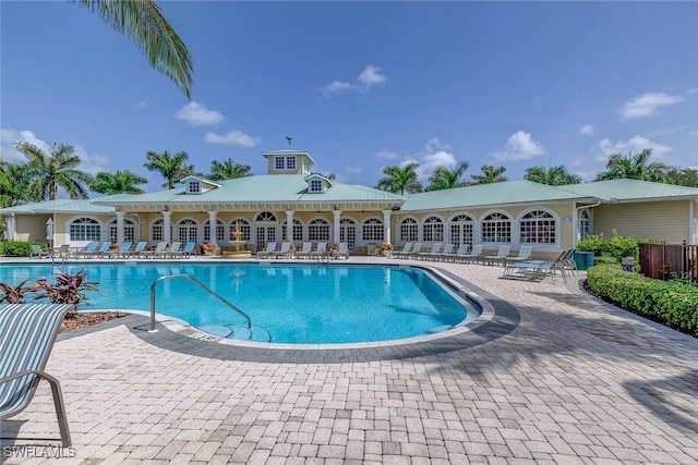 pool with a patio