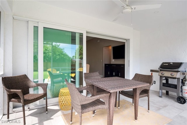 522 110th Ave N, Naples, FL 34108 - view of patio featuring a ceiling fan, outdoor dining area, and a grill