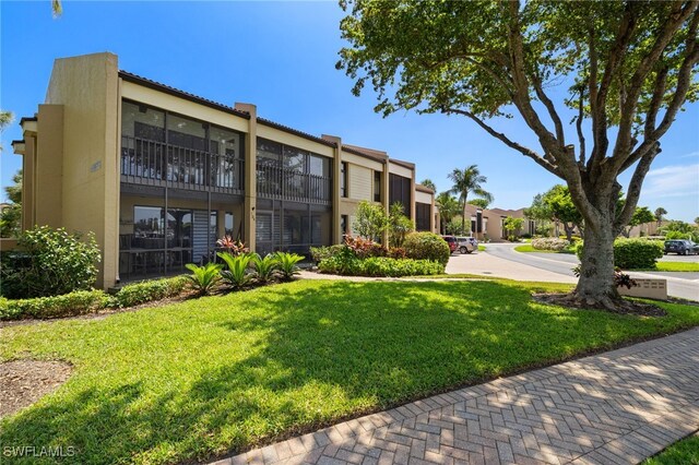 4855 Dockside Dr Unit 204, Fort Myers, FL 33919 - view of building exterior featuring a residential view