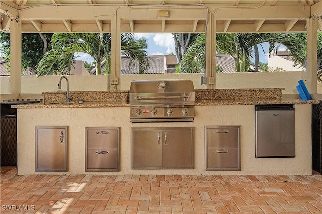 4855 Dockside Dr Unit 204, Fort Myers, FL 33919 - view of patio / terrace featuring a sink