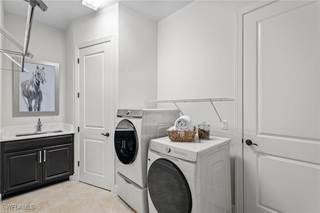 9476 Livorno Ct, Naples, FL 34119 - laundry area with independent washer and dryer and light tile patterned flooring