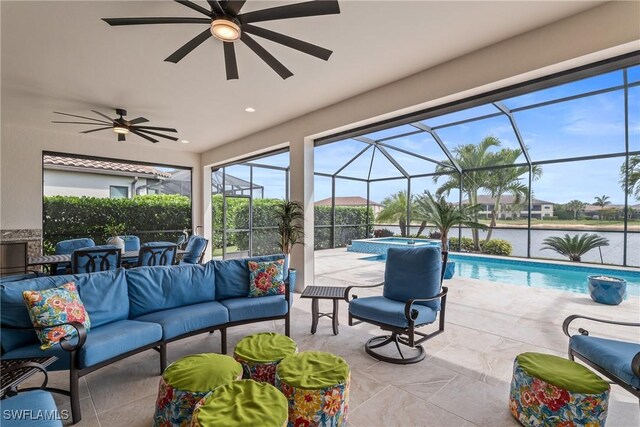 9476 Livorno Ct, Naples, FL 34119 - view of patio / terrace featuring an outdoor hangout area, ceiling fan, a pool with connected hot tub, and a lanai