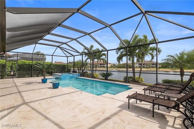 9476 Livorno Ct, Naples, FL 34119 - view of swimming pool featuring a patio area, a water view, a pool with connected hot tub, and a lanai