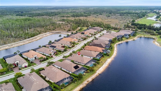 9476 Livorno Ct, Naples, FL 34119 - aerial overview of property's location featuring nearby suburban area and a nearby body of water