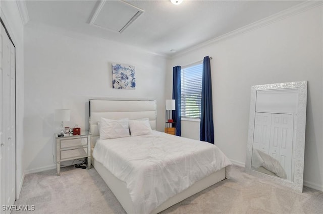 bedroom featuring crown molding, baseboards, and carpet