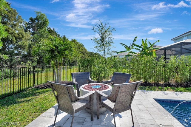 view of patio / terrace featuring fence and a fenced in pool