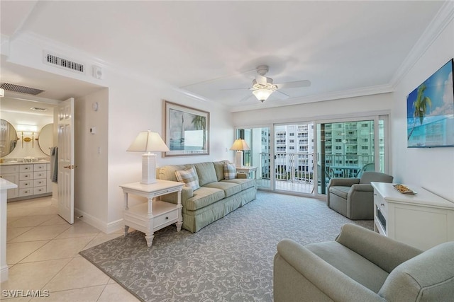 3443 Gulf Shore Blvd N Unit 403, Naples, FL 34103 - living room with ceiling fan, visible vents, baseboards, ornamental molding, and light tile patterned flooring
