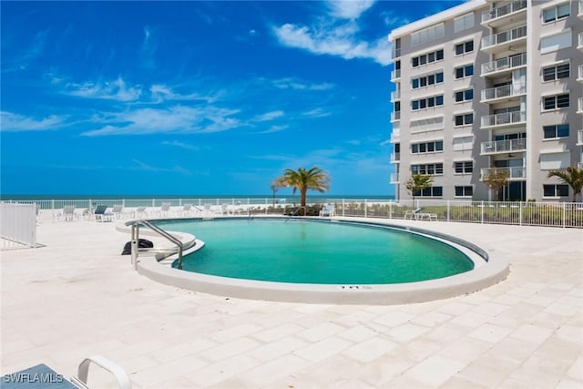 3443 Gulf Shore Blvd N Unit 403, Naples, FL 34103 - community pool with fence and a patio area