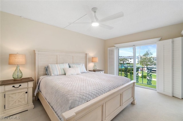 383 Harbour Dr Unit 209, Naples, FL 34103 - bedroom featuring light carpet and ceiling fan