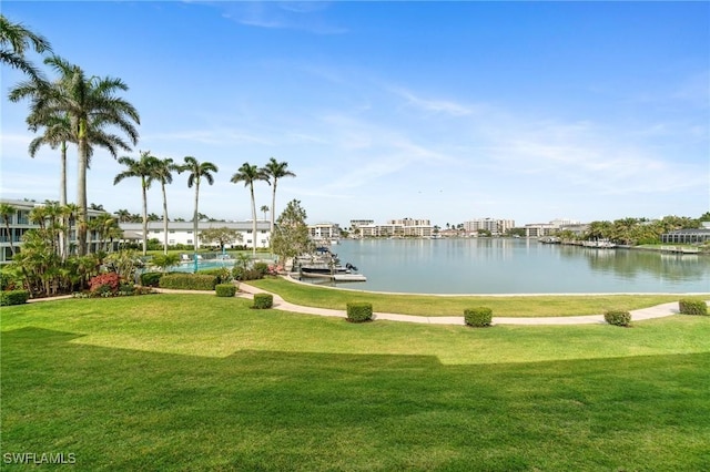 383 Harbour Dr Unit 209, Naples, FL 34103 - view of home's community with a yard and a water view