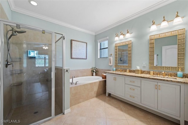 20374 Black Tree Ln, Estero, FL 33928 - bathroom featuring double vanity, a bath, a shower stall, tile patterned floors, and crown molding