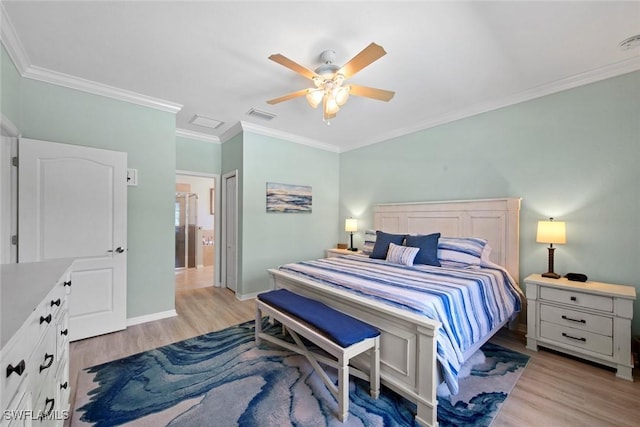 20374 Black Tree Ln, Estero, FL 33928 - bedroom featuring light wood-type flooring, ornamental molding, baseboards, ceiling fan, and attic access