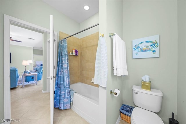 20374 Black Tree Ln, Estero, FL 33928 - bathroom featuring shower / bath combo, toilet, tile patterned flooring, and ensuite bathroom