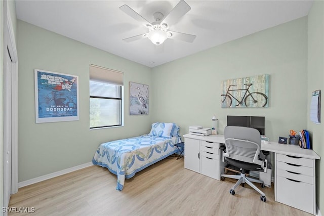 20374 Black Tree Ln, Estero, FL 33928 - bedroom featuring light wood-style flooring, a desk, baseboards, and a ceiling fan