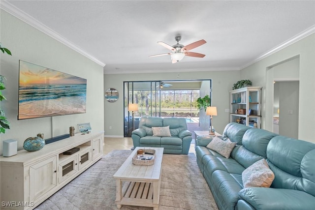 20374 Black Tree Ln, Estero, FL 33928 - living area featuring ornamental molding, ceiling fan, and baseboards