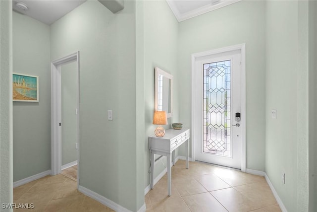 20374 Black Tree Ln, Estero, FL 33928 - foyer featuring light tile patterned floors, crown molding, and baseboards