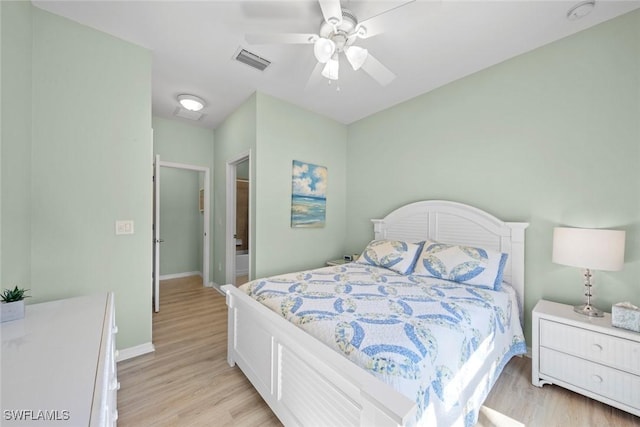 20374 Black Tree Ln, Estero, FL 33928 - bedroom with light wood-style floors, baseboards, and a ceiling fan