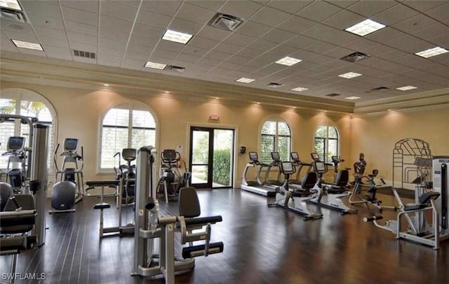 20374 Black Tree Ln, Estero, FL 33928 - workout area with crown molding, a paneled ceiling, and wood finished floors