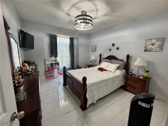 2618 35th Ave NE, Naples, FL 34120 - bedroom with marble finish floor and baseboards