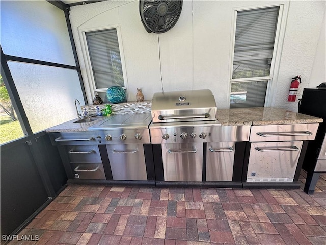2618 35th Ave NE, Naples, FL 34120 - view of patio / terrace featuring an outdoor kitchen and area for grilling