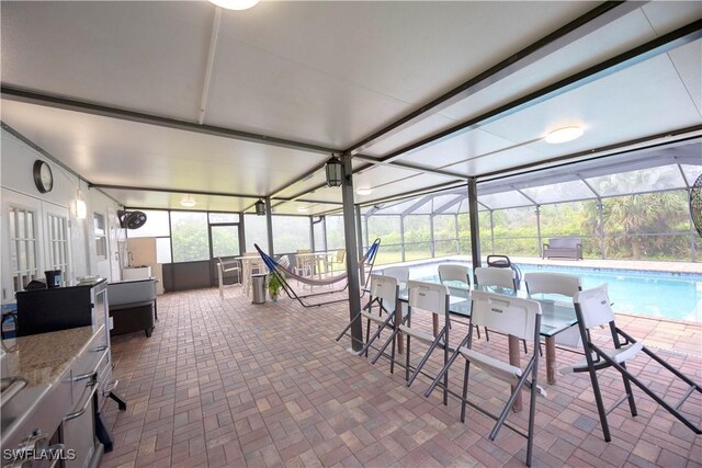 2618 35th Ave NE, Naples, FL 34120 - view of patio / terrace with a lanai and an outdoor pool