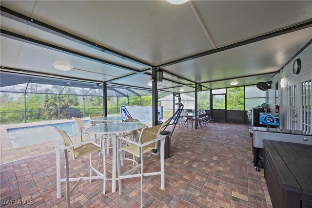 2618 35th Ave NE, Naples, FL 34120 - sunroom / solarium with outdoor dining area