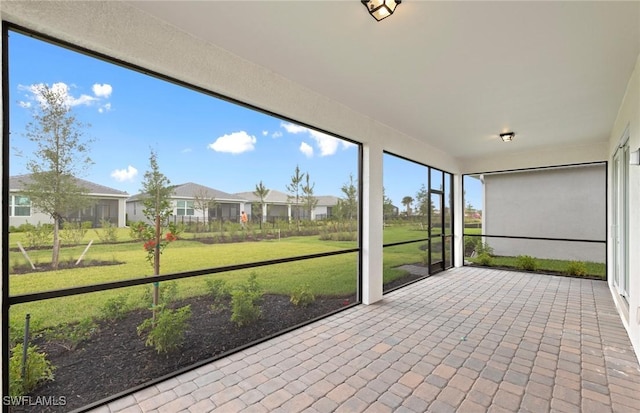 17313 Willow Tree Ln, North Fort Myers, FL 33917 - unfurnished sunroom with a residential view