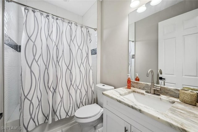 3407 20th St SW, Lehigh Acres, FL 33976 - bathroom with shower / bath combo with shower curtain, vanity, and toilet