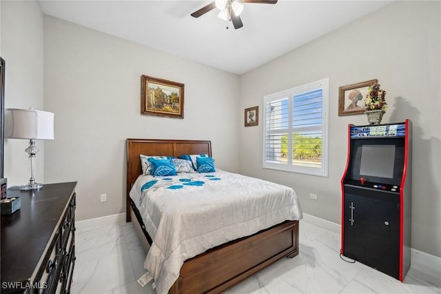 3407 20th St SW, Lehigh Acres, FL 33976 - bedroom featuring baseboards, a ceiling fan, and marble finish floor