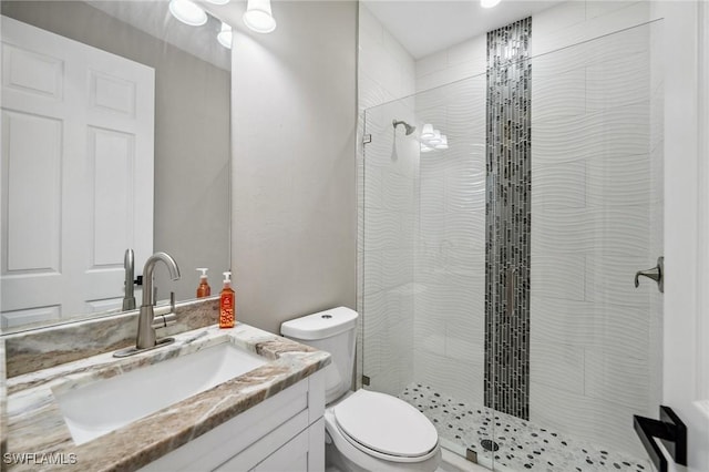 3407 20th St SW, Lehigh Acres, FL 33976 - bathroom with toilet, a walk in shower, and vanity