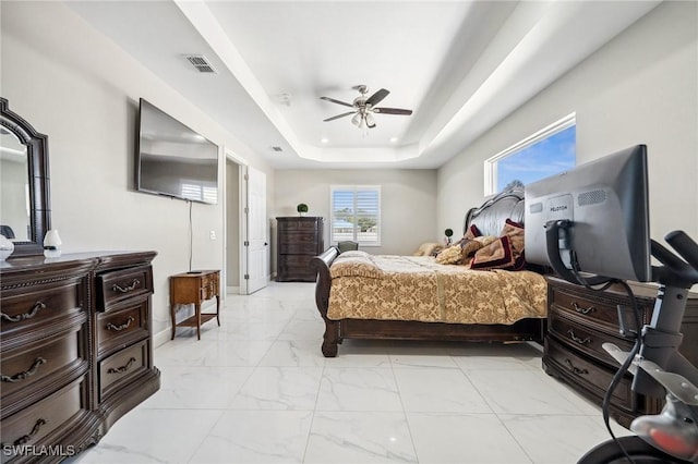 3407 20th St SW, Lehigh Acres, FL 33976 - bedroom featuring visible vents, baseboards, a raised ceiling, ceiling fan, and marble finish floor