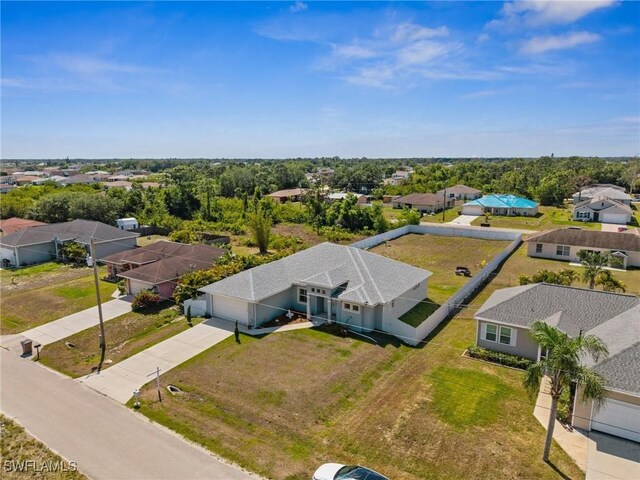 3407 20th St SW, Lehigh Acres, FL 33976 - bird's eye view featuring a residential view